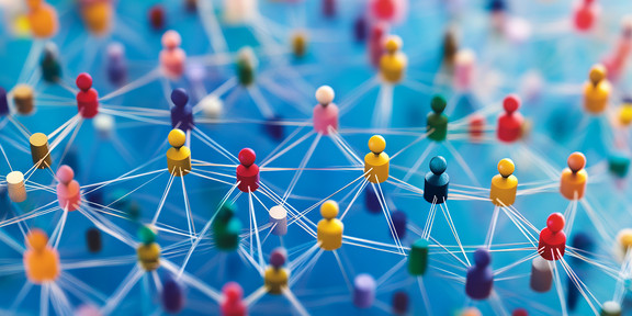 Colored pins, which are connected with lines, against a blue background