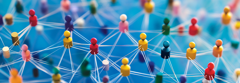 Colored pins, which are connected with lines, against a blue background