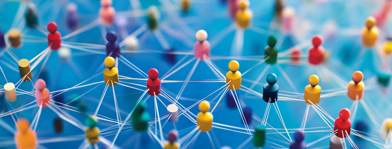 Colored pins, which are connected with lines, against a blue background